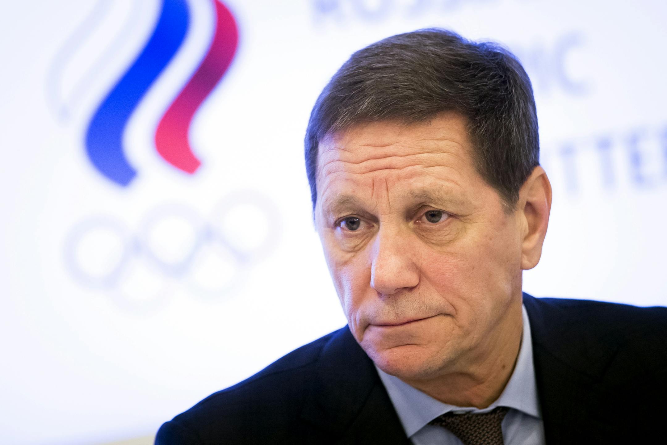 Russian Olympic Committee President Alexander Zhukov speaks to the media after an Russian Olympic committee meeting in Moscow, Russia, Tuesday, Dec. 12, 2017. The Russian Olympic Committee formally gave its blessing Tuesday for the country's athletes to compete under a neutral flag at the upcoming Pyeongchang Games. (AP Photo/Ivan Sekretarev)