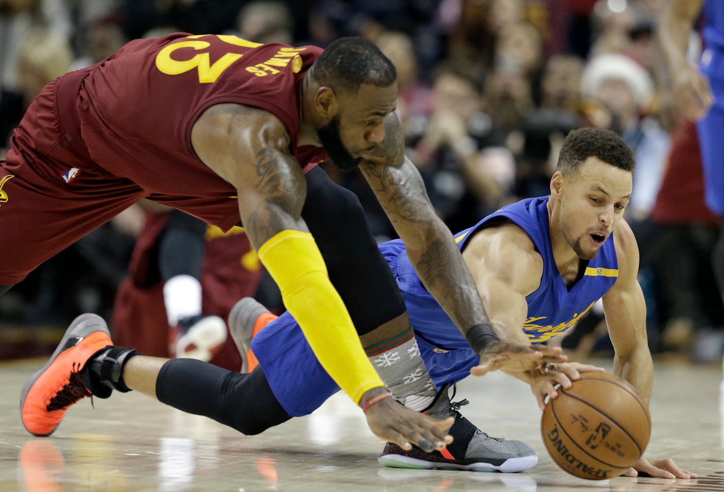 Kyrie Irving is gone to Boston, but LeBron James (left, scrambling for a loose ball against the Warriors Stephen Curry) remains and that will be enough to keep the Cavs one of the top teams in the East.