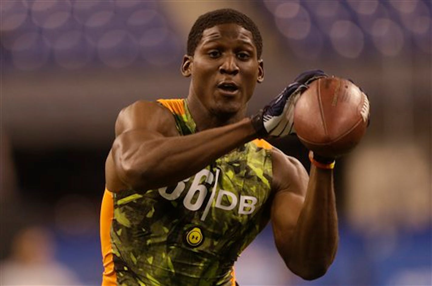 Florida State defensive back Xavier Rhodes runs a drill during the NFL football scouting combine in Indianapolis, Tuesday, Feb. 26, 2013. (AP Photo/Dave Martin)