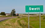 A road marker highlights Swett, S.D.'s small borders. The ghost town is up for sale for $250,000.