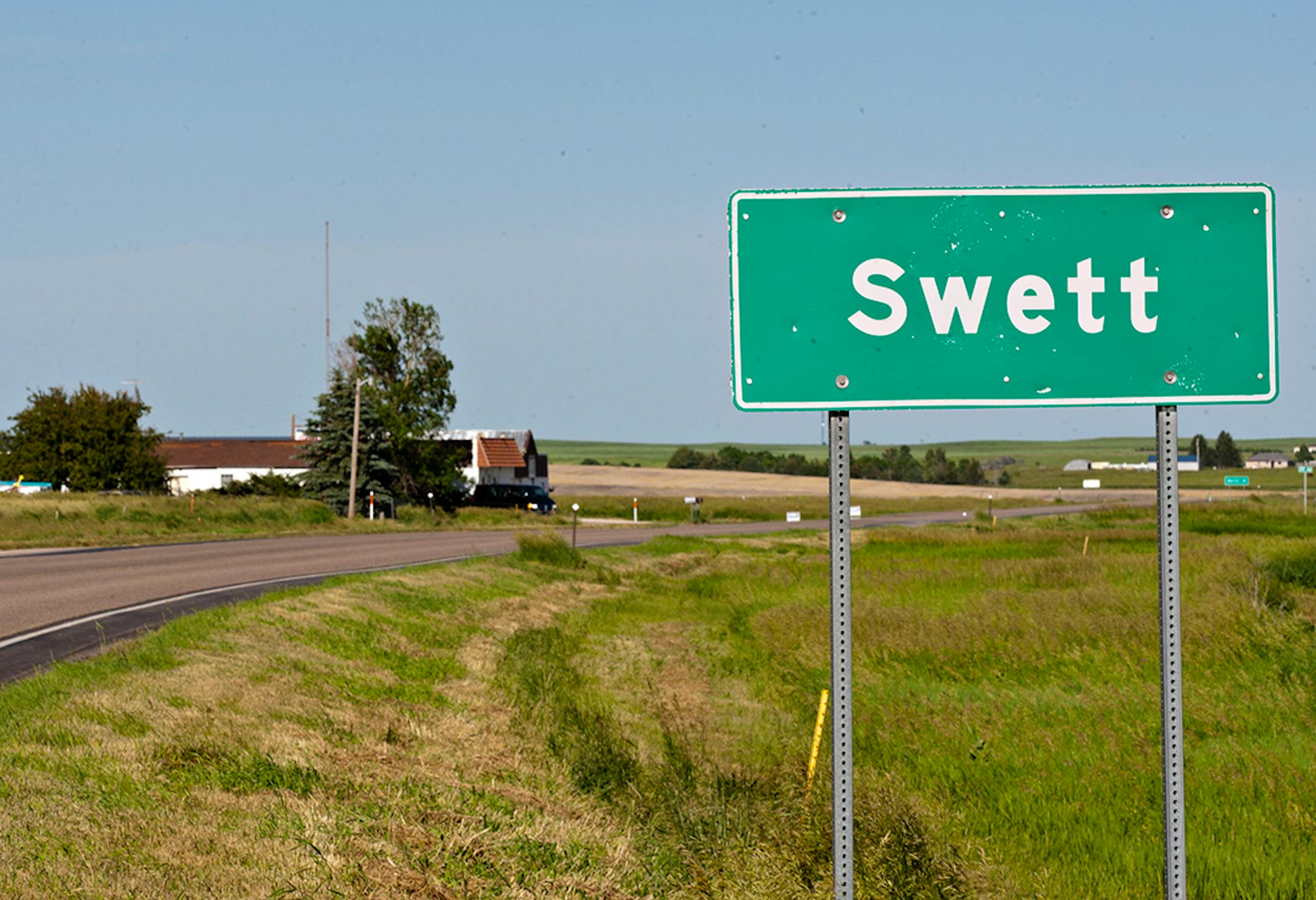 A road marker highlights Swett, S.D.'s small borders. The ghost town is up for sale for $250,000.