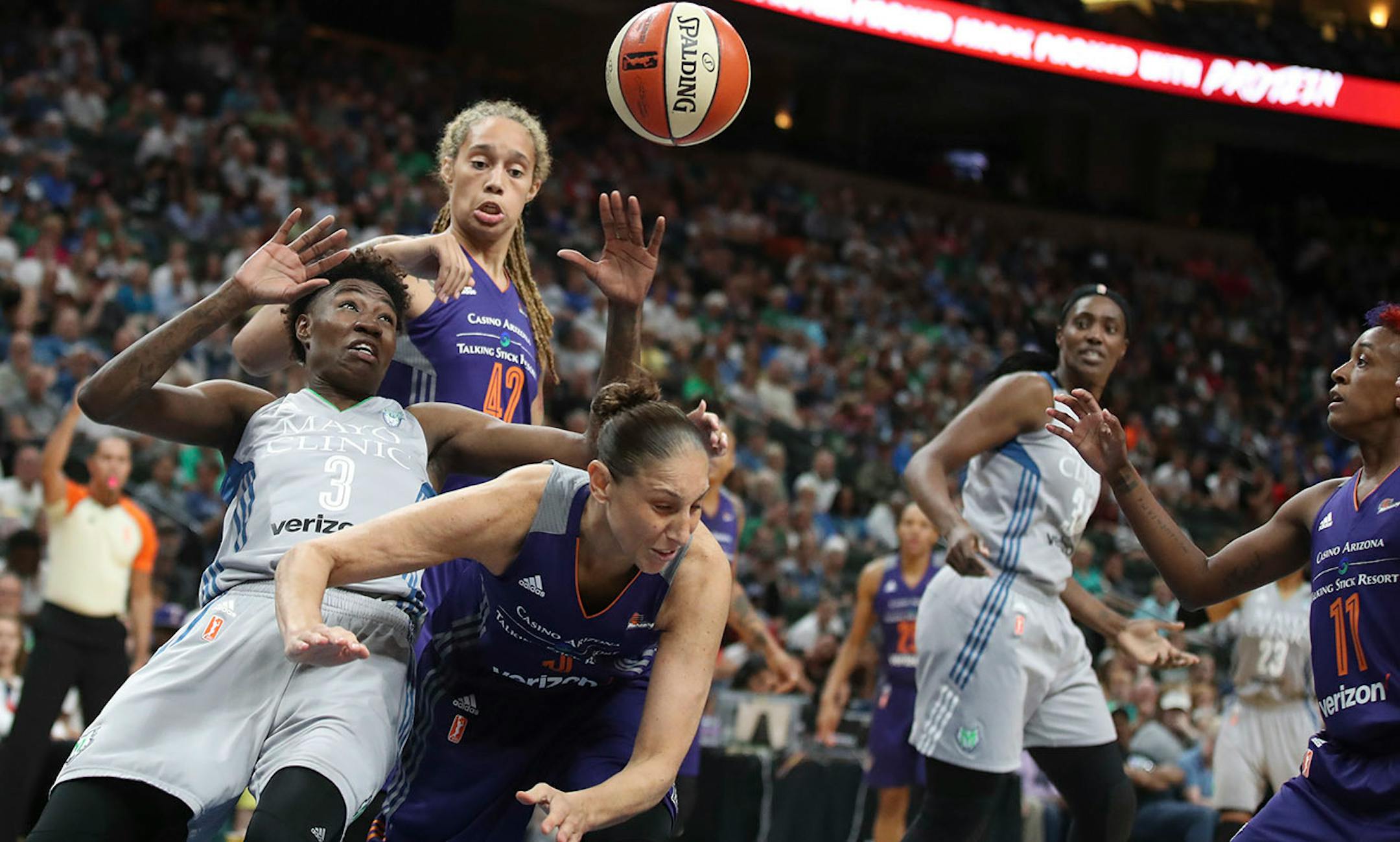 Minnesota Lynx forward Natasha Howard (3) was fouled by Phoenix Mercury guard Diana Taurasi (3), as her teammate center Brittney Griner (42) looked on in the first half at Xcel Energy Center on Tuesday August 22,2017 in St. Paul, MN.