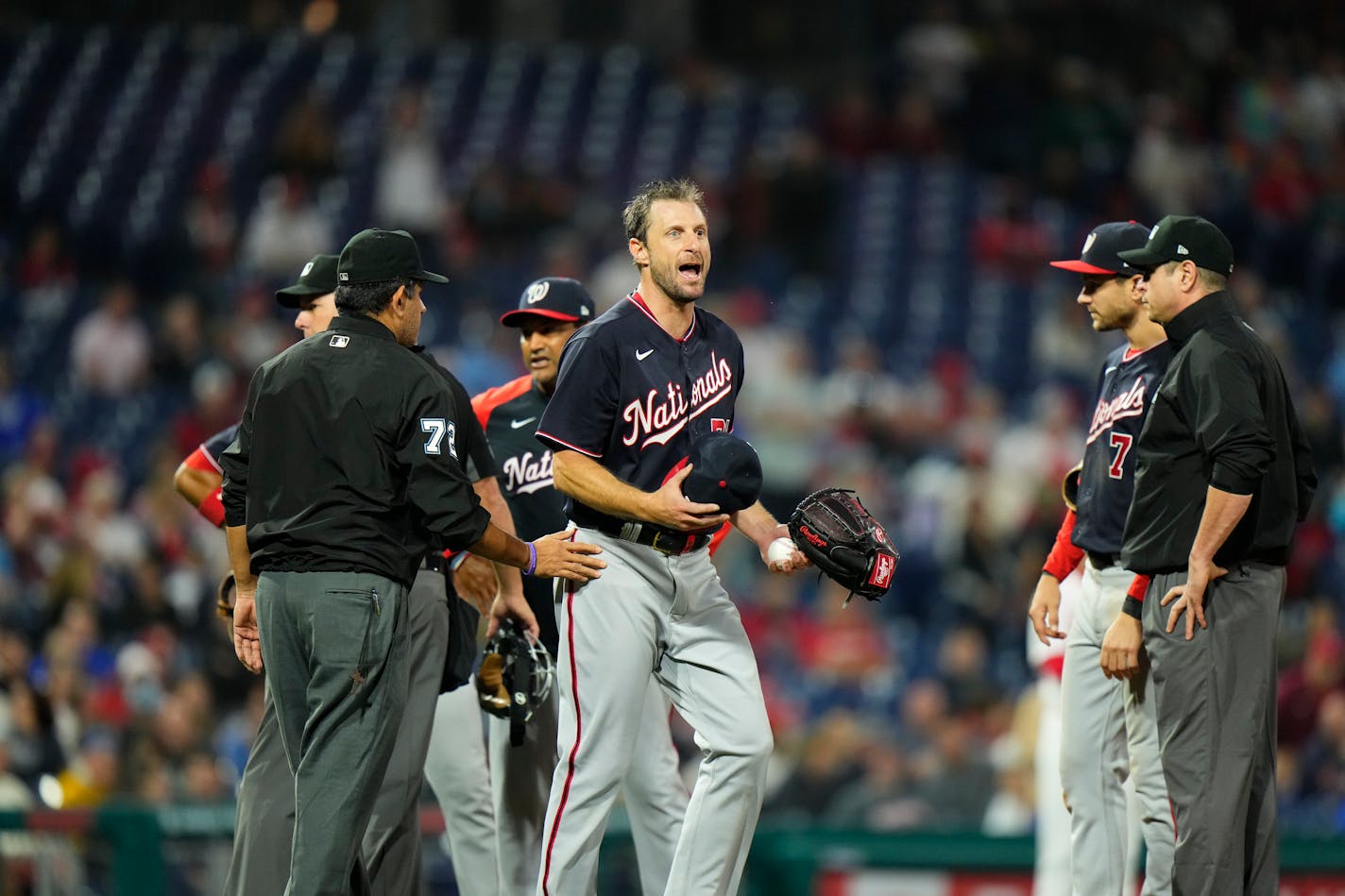 Washington Nationals' Max Scherzer reacts as he is being checked for foreign substances during a baseball game against the Philadelphia Phillies, Tuesday, June 22, 2021, in Philadelphia. (AP Photo/Matt Slocum)