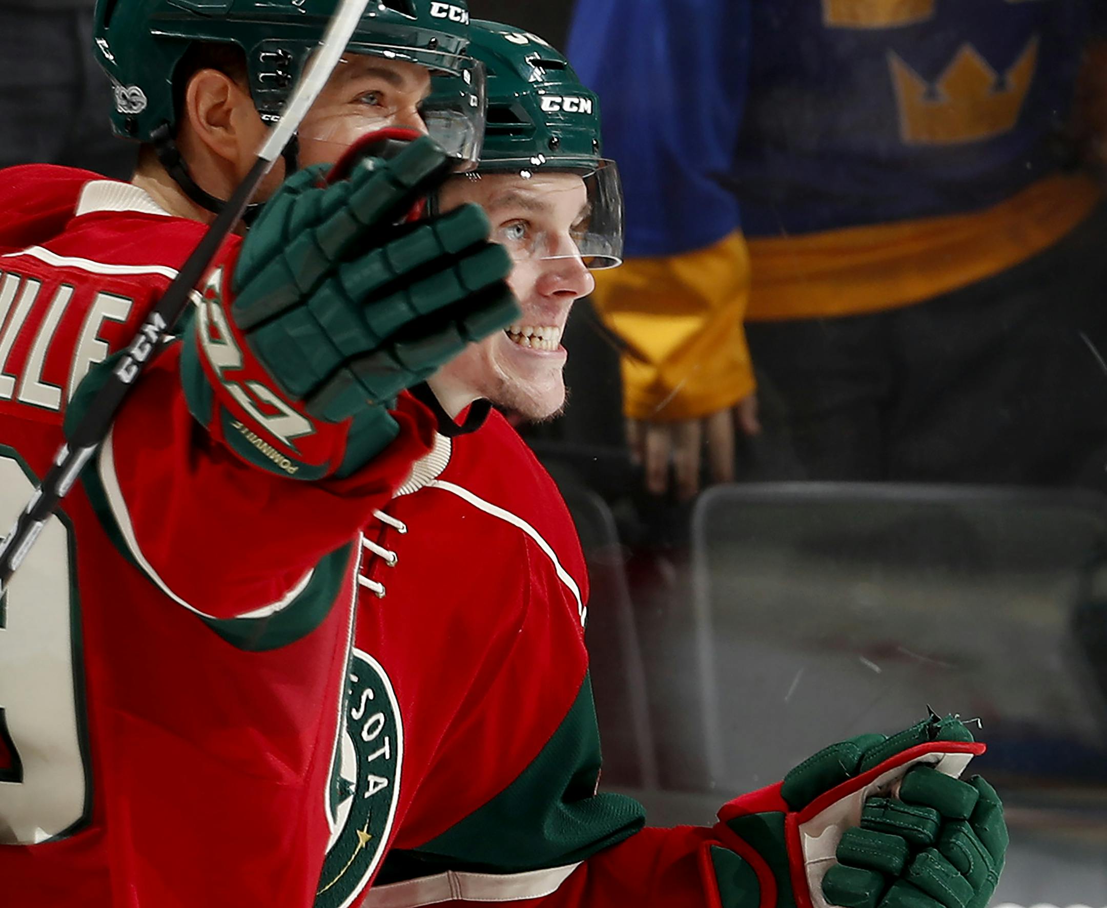 Erik Haula (56) celebrated with Jason Pominville (29) after scoring a goal in the second period. ] CARLOS GONZALEZ ï cgonzalez@startribune.com - January 26, 2017, St. Paul, MN, Xcel Energy Center, NHL, Hockey, St. Louis Blues at Minnesota Wild