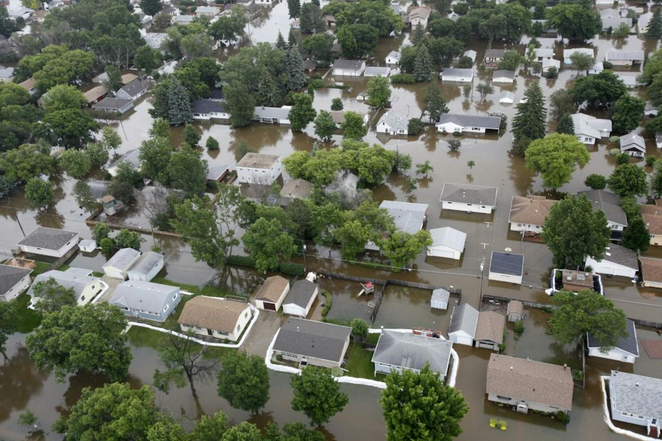 Floodwaters of the Souris River last month in Minot, N.D.