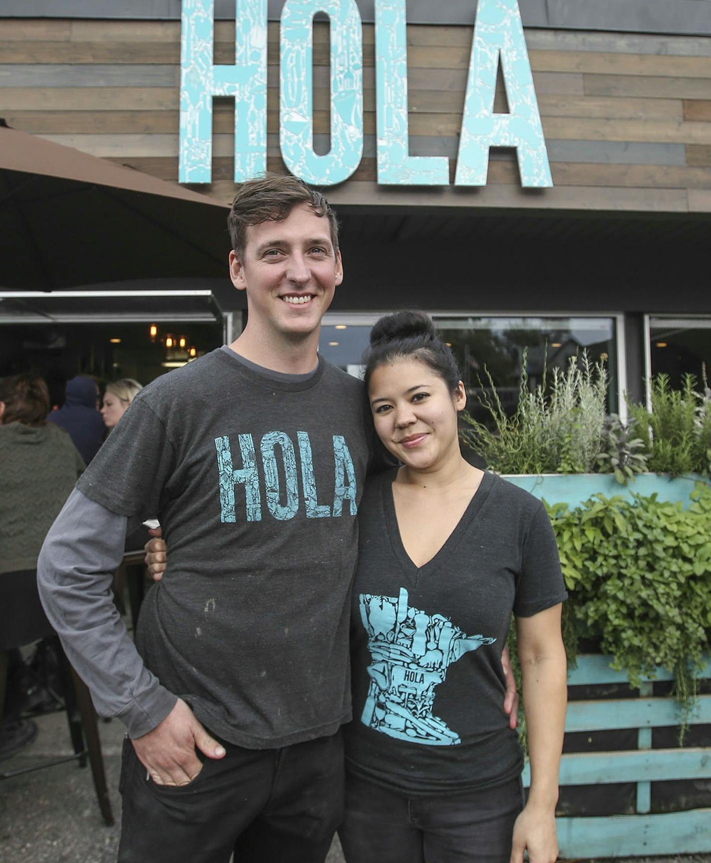 Hola Arepa, one of the city's great food trucks and now a restaurant, with co-owners Birk Grudem and Christina Nguyen Friday, Sept. 12, 2014, in Minneapolis, MN.](DAVID JOLES/STARTRIBUNE)djoles@startribune.com Hola Arepa, one of the city's great food trucks, is now a restaurant, with a slightly expanded menu and an excellent cocktail list.