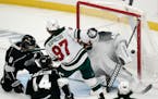 Minnesota Wild's Kirill Kaprizov watches the puck enter the net past Los Angeles goaltender Calvin Petersen for a goal during the first period Friday.