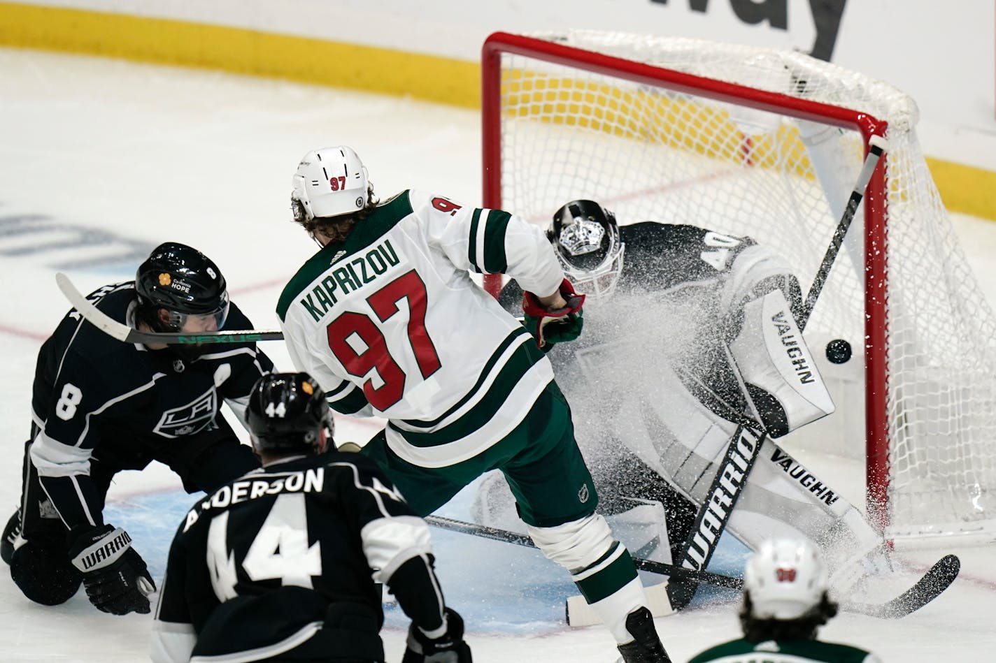 Minnesota Wild's Kirill Kaprizov watches the puck enter the net past Los Angeles goaltender Calvin Petersen for a goal during the first period Friday.