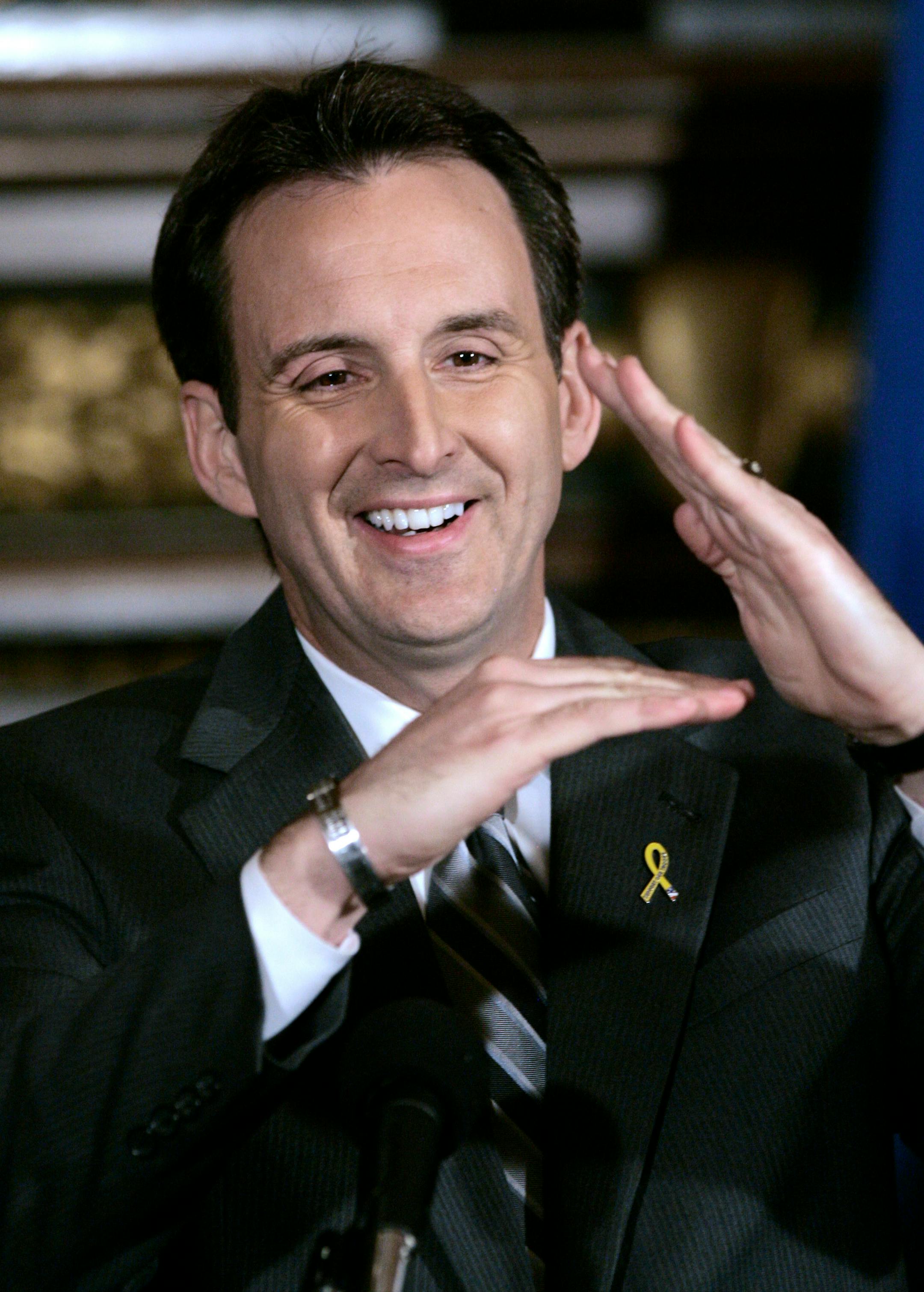 Gov. Tim Pawlenty called the deficit "serious but solvable." True to form, he said he won't seek a tax increase.