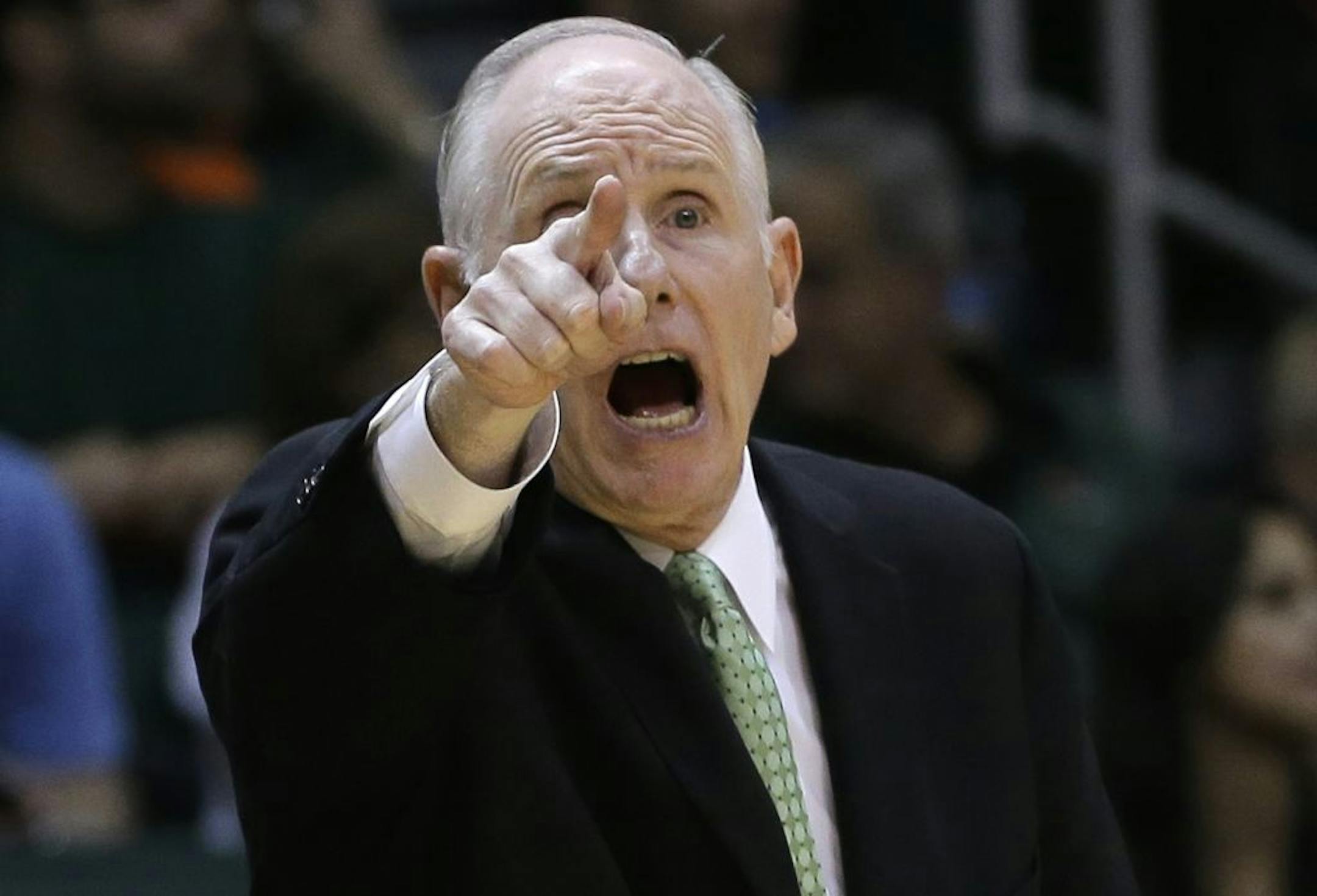 Miami coach Jim Larranaga reacts to a play by Virginia during the second half of an NCAA college basketball game in Coral Gables, Fla., Tuesday, Feb. 19, 2013. Miami won 54-50.