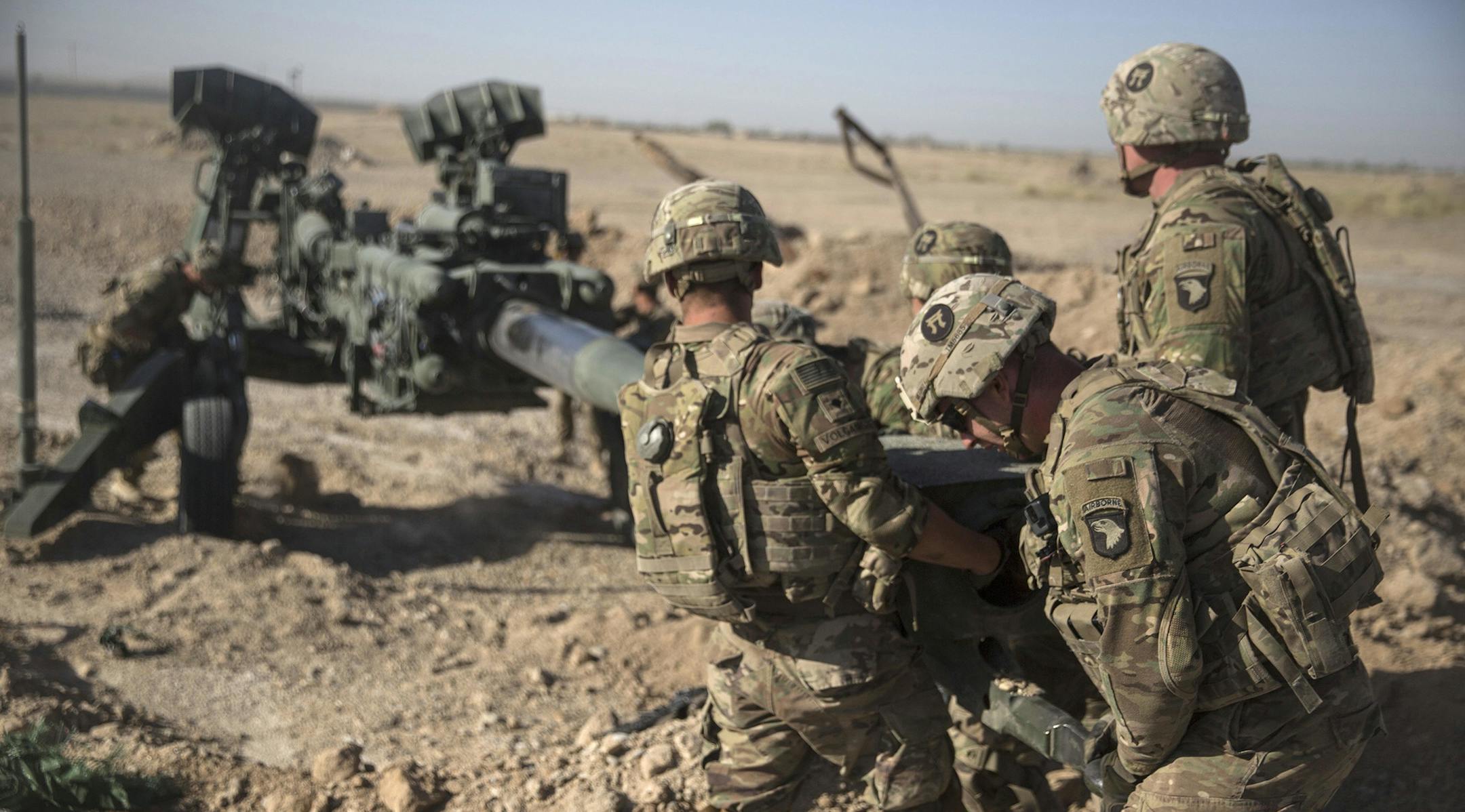 This June 10, 2017 photo provided by Operation Resolute Support, U.S. Soldiers with Task Force Iron maneuver an M-777 howitzer, so it can be towed into position at Bost Airfield, Afghanistan. Sixteen years into its longest war, the United States is sending another 4,000 troops to Afghanistan in an attempt to turn around a conflict characterized by some of the worst violence since the Taliban were ousted in 2001. They are also facing the emergence of an Islamic State group affiliate and an embold