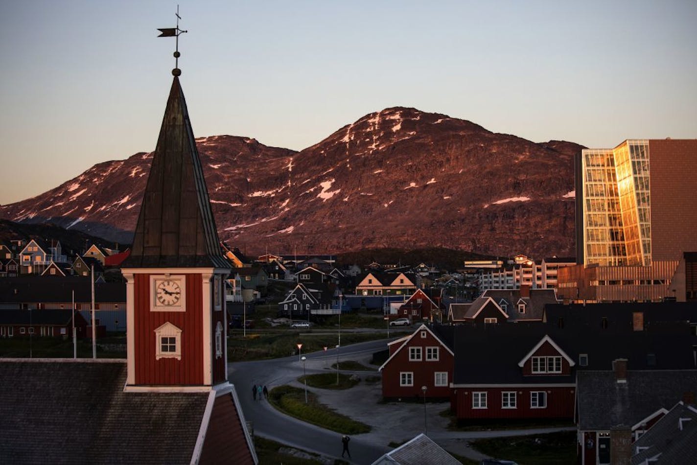 The sun sets over Nuuk, Greenland, in 2017. The Trump administration is planning to open a U.S. consulate in Greenland for the first time in decades amid increased strategic and economic interest in the Danish territory.