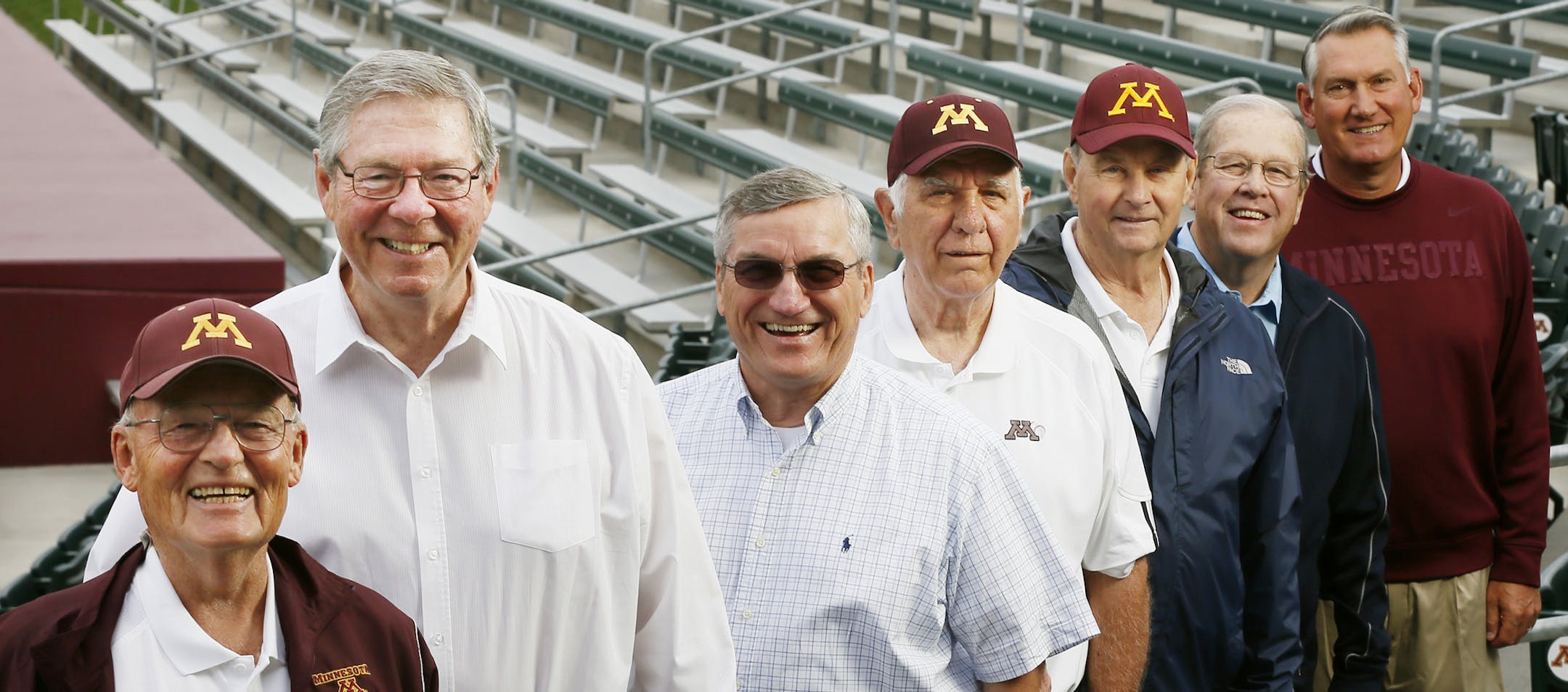 Former University of Minnesota players from the College World Series champs of 1956-60--64 left to right Jerry Thomas (1956), Bill Davis (1964), Jerry Cawley (1964), Jack McCartan (1956), Doug Gillen (1956), Jim Rantz (1960) and John Anderson (current Gophers coach), posed for a portrait at Seibert Field Wednesday June 25, 2014 in Minneapolis, MN. ] Jerry Holt Jerry.holt@startribune.com