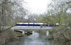 A rendering of the Southwest Light Rail train passing through the Kenilworth Lagoon ORG XMIT: MIN1605131425430376