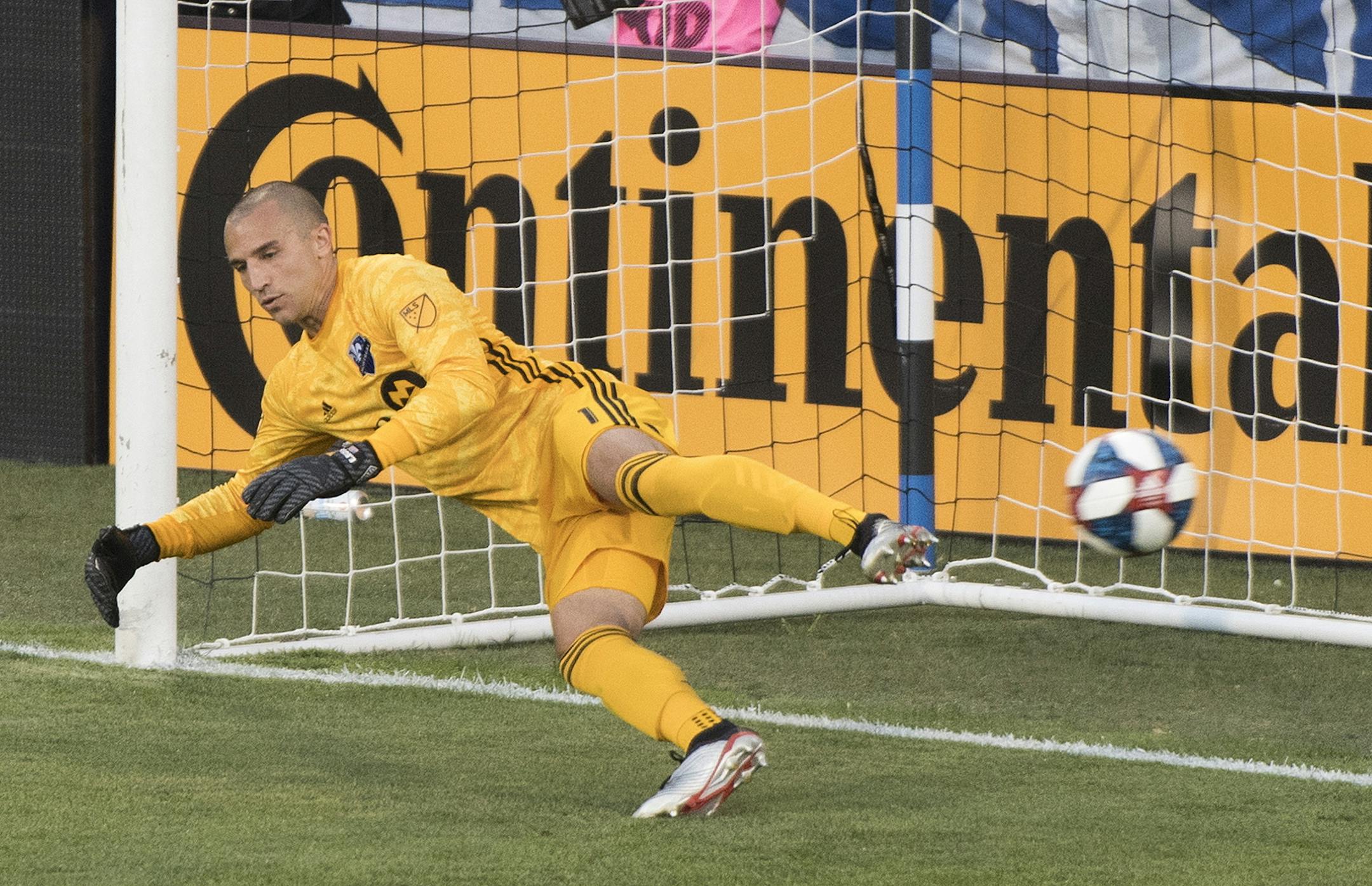 Montreal Impact goalkeeper Evan Bush gives up a goal from the penalty spot to Minnesota United's Ethan Finlay during the first half of an MLS soccer match Saturday, July 6, 2019, in Montreal. (Graham Hughes/The Canadian Press via AP)