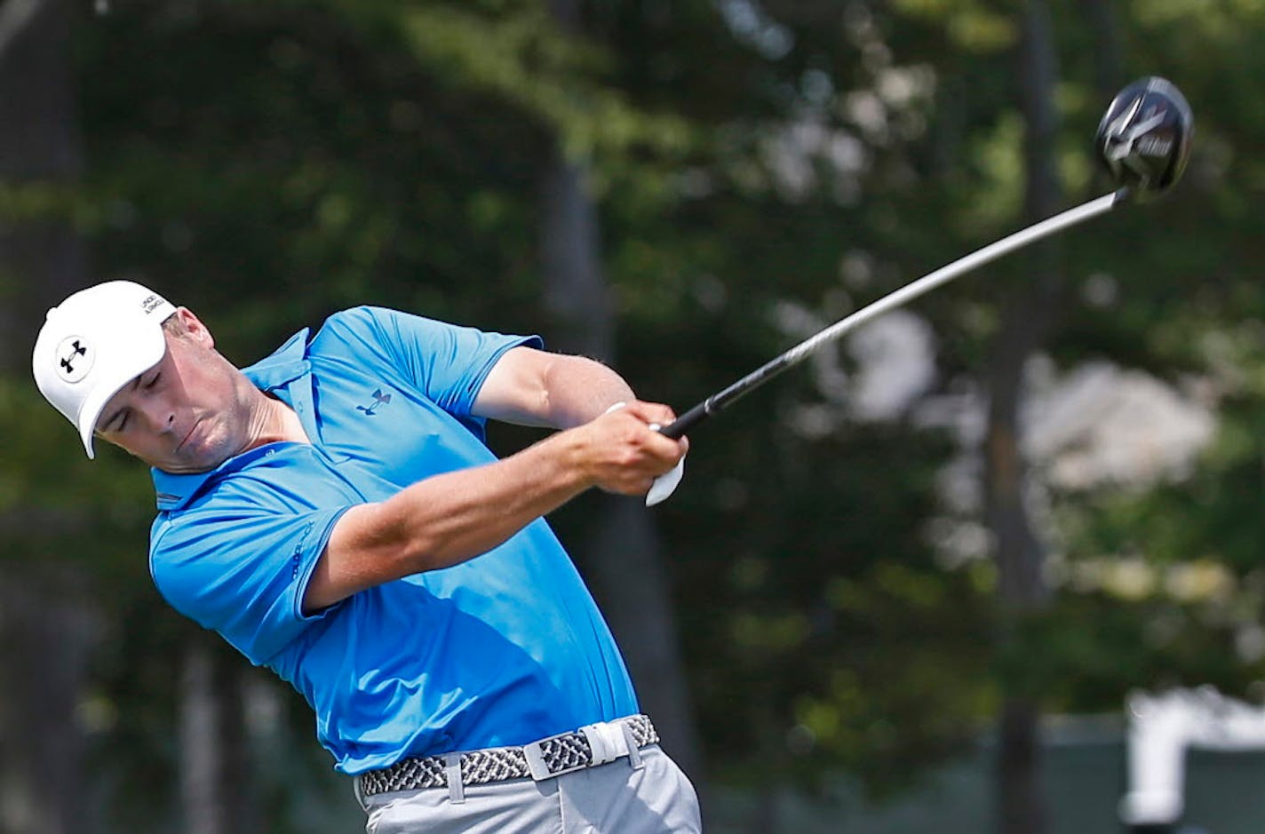 Jordan Spieth hits a drive on the first hole during the fourth round of the PGA Championship golf tournament Sunday, Aug. 16, 2015, at Whistling Straits in Haven, Wis. (AP Photo/Julio Cortez)