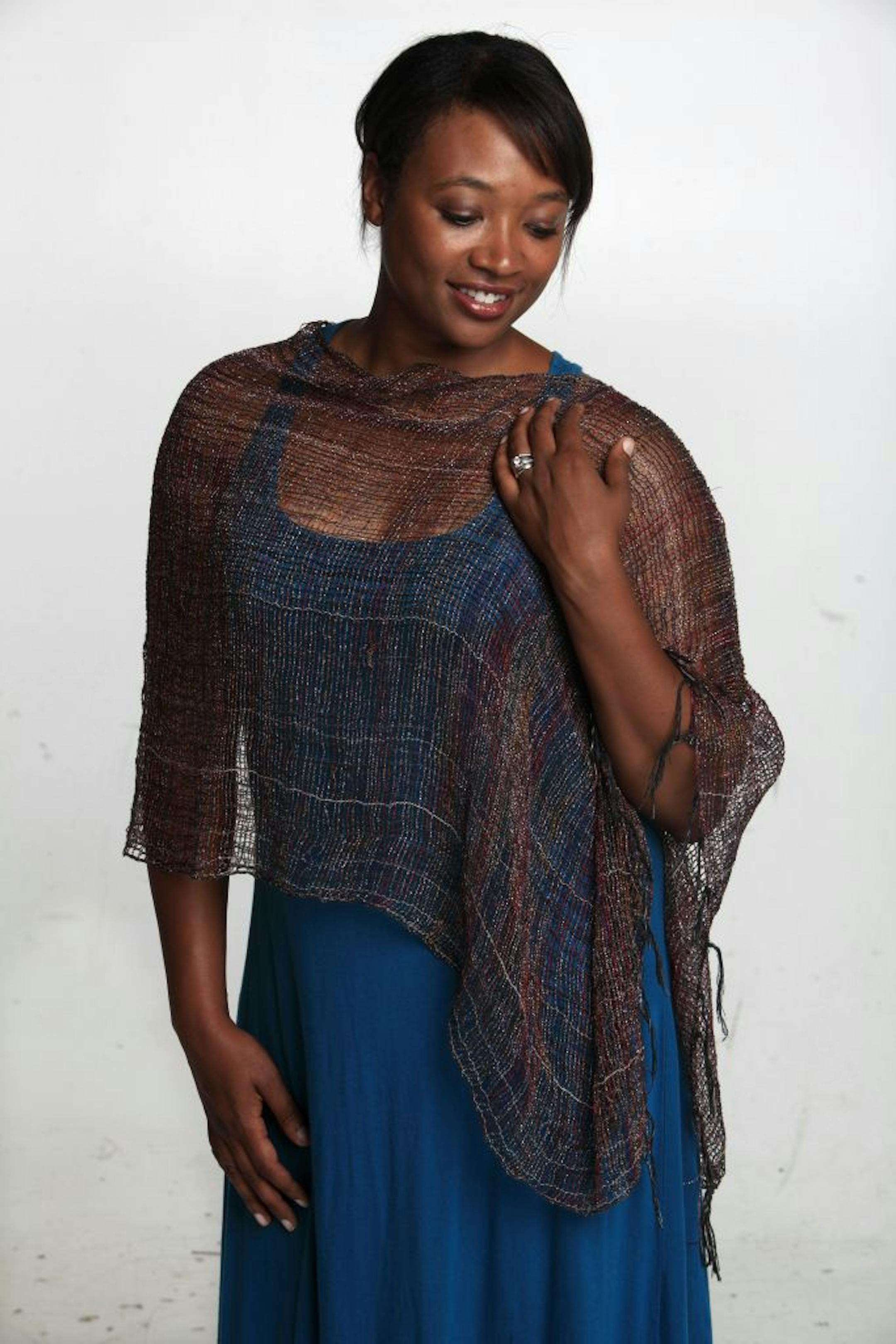 How to dress to keep cool without showing too much skin. We'll have 3 to 4 "real people" models showing how to use everyday articles of clothing to make hot-weather outfits be a better fit for the office., MN. July 18, 2012.