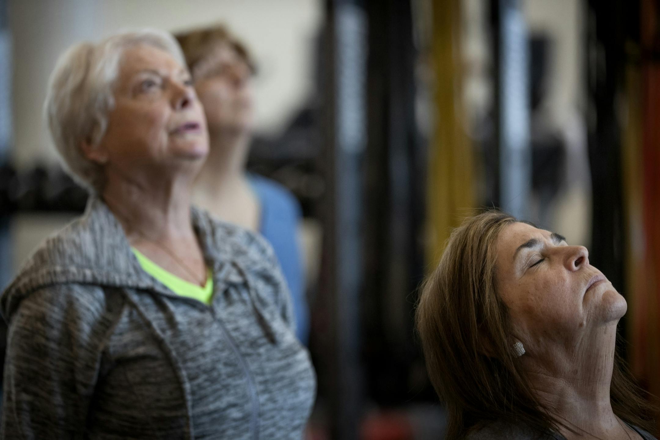 Susan Bjornsen, left, Mary Johnson and Josephine Camilleri did cool down stretches at the Dan Abraham healthy living center in Rochester.