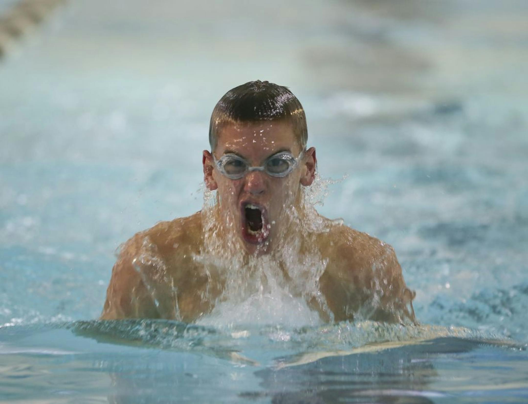 Sophomore James Tidd, practicing the breaststroke, is part of a bevy of young talent on East Ridge's surprisingly strong swimming squad. Photo by Jeff Wheeler • jwheeler@startribune.com