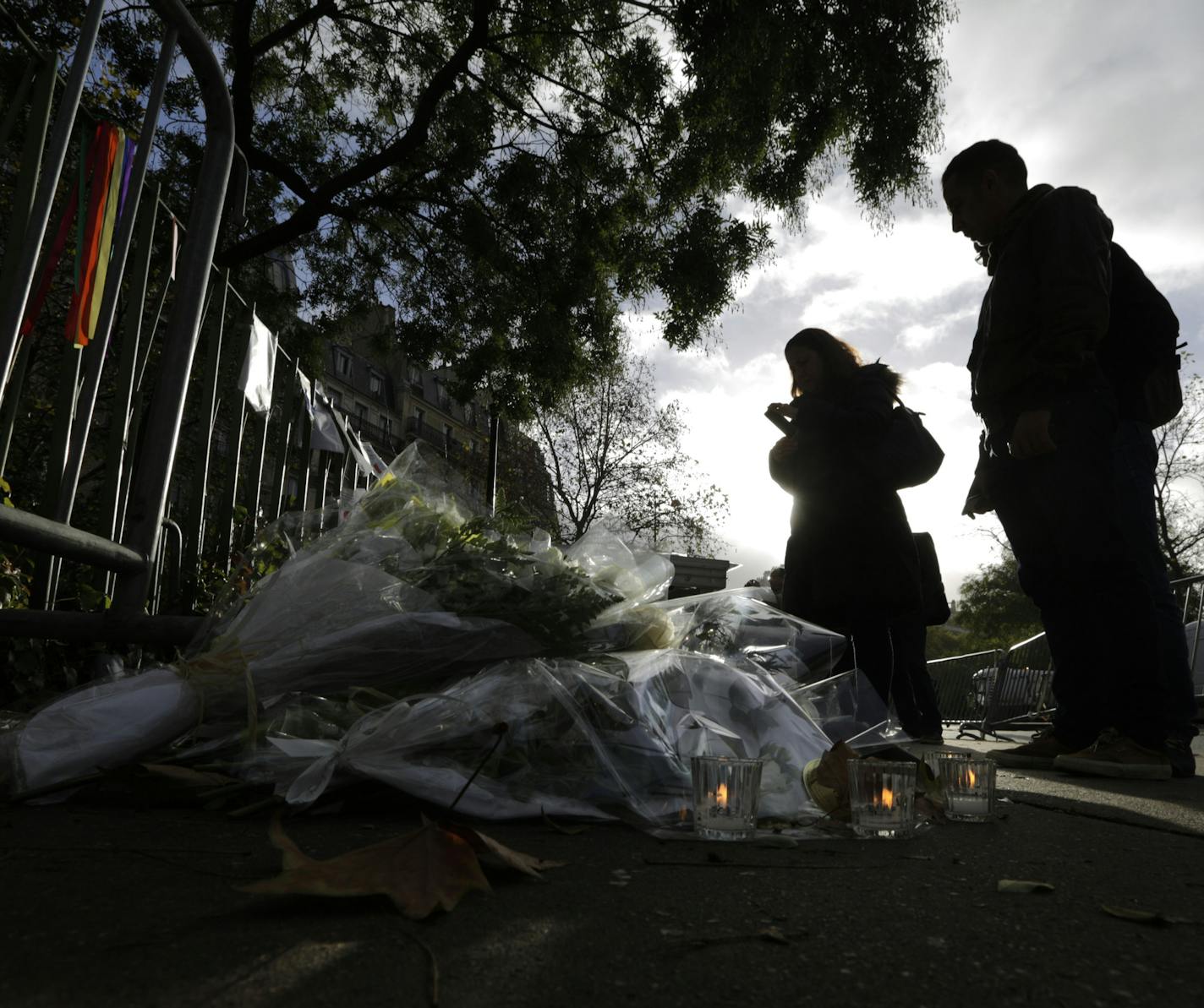 People paid their respects at a makeshift memorial next to the Bataclan concert hall in Paris in November 2015.