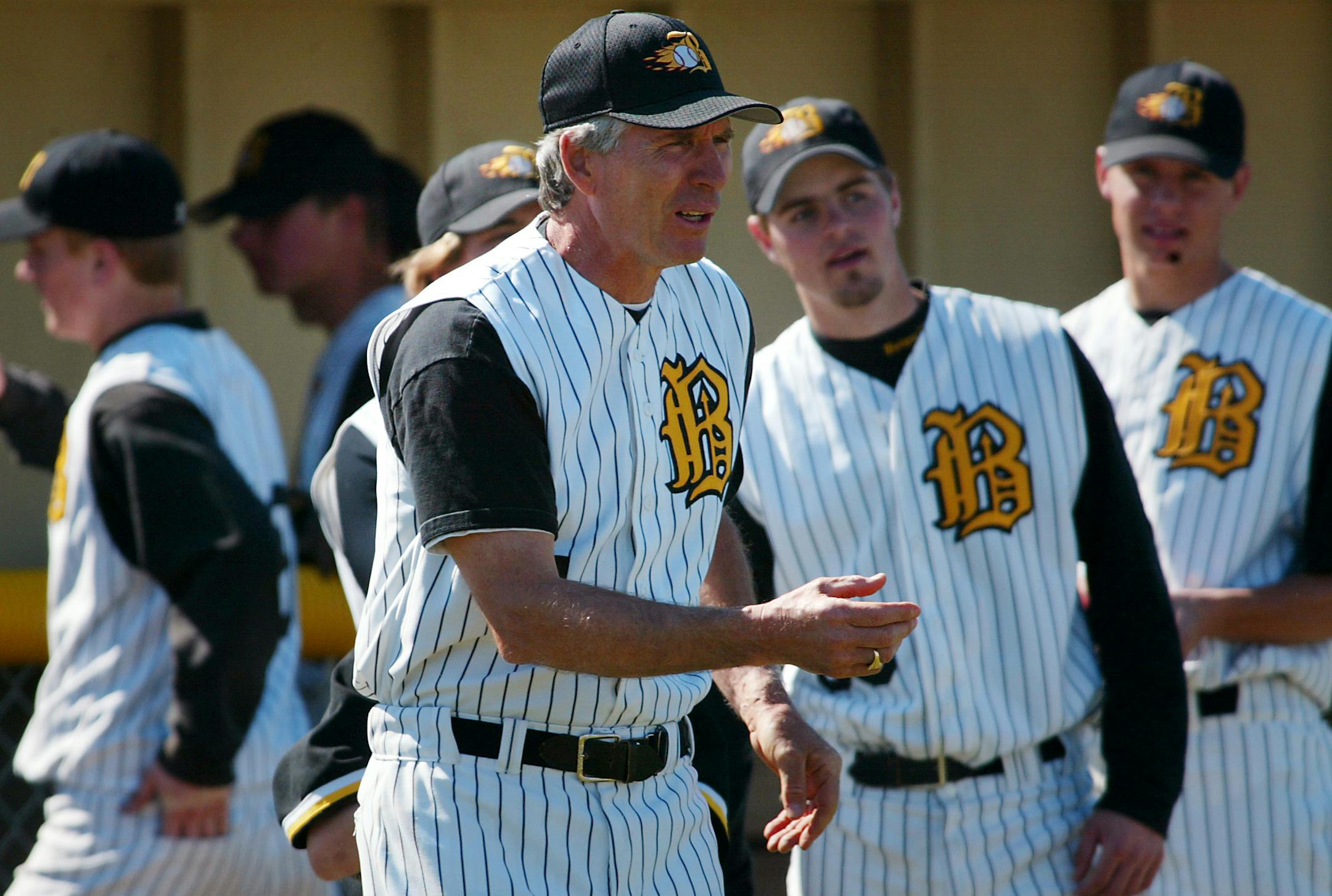 Burnsville, MN - 5/20/2002 Burnsville high School baseball coach Neal Jeppson (Center) coached his last regular-season game Monday night against Rosemount. He is retiring after 29 seasons