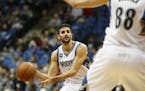 Minnesota Timberwolves guard Ricky Rubio (9) looks to pass the ball against Toronto Raptors in the first half of an NBA basketball game Wednesday, Feb