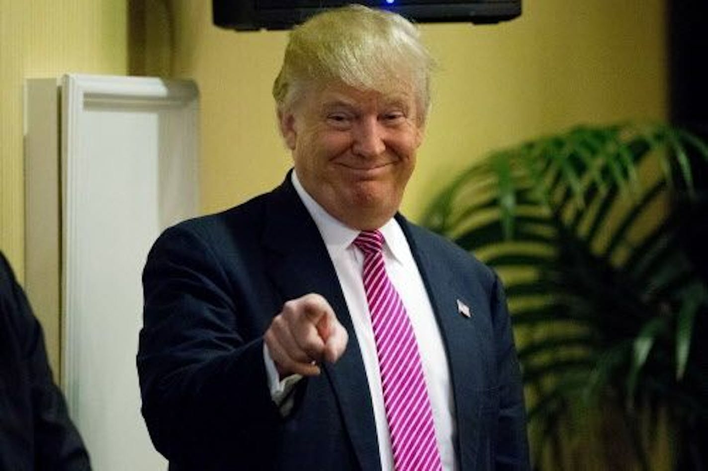 Republican presidential candidate Donald Trump gestures before speaking during a campaign stop Monday, Feb. 15, 2016, in Mount Pleasant, S.C.