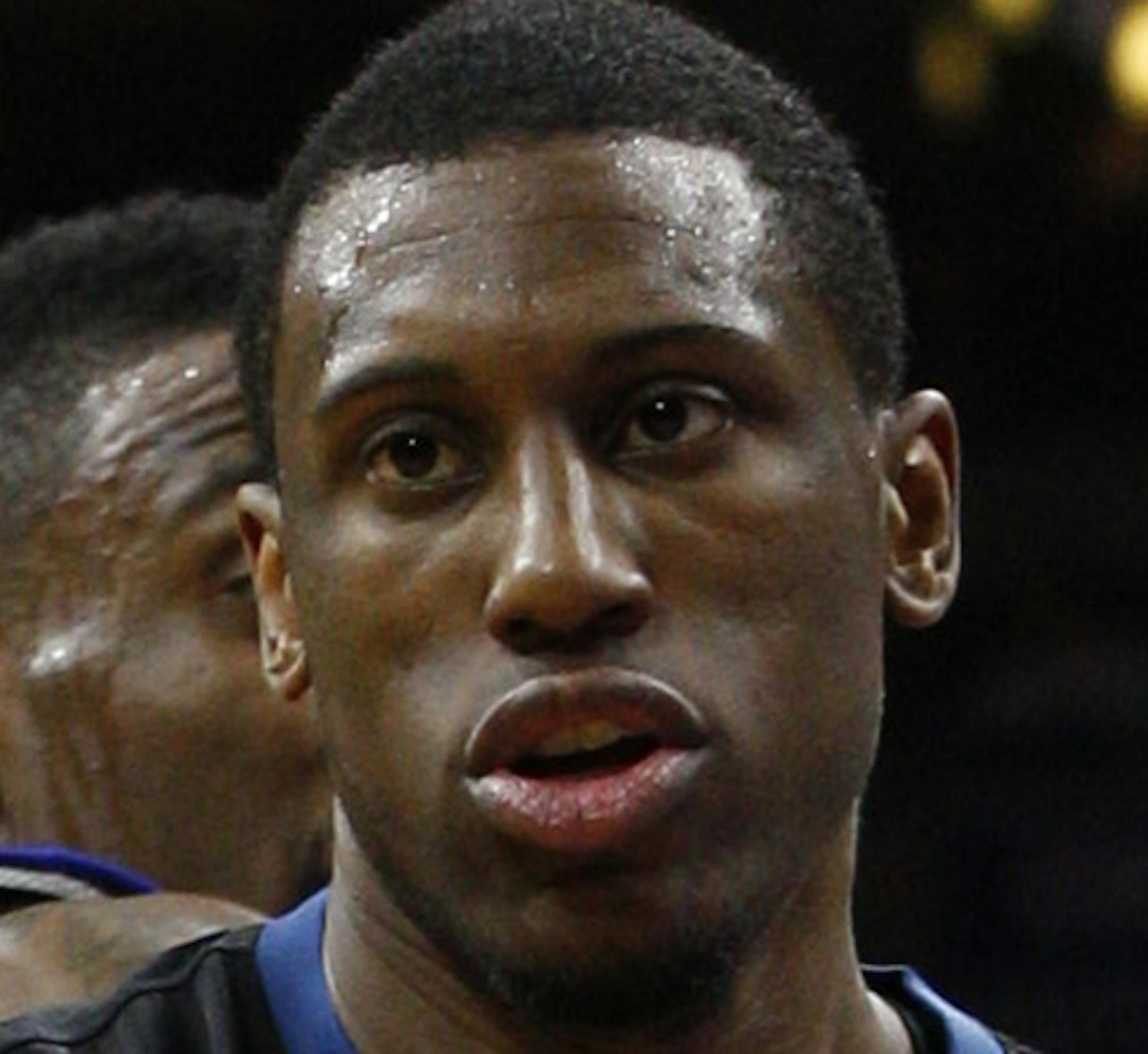 Minnesota Timberwolves' Thaddeus Young (33) looks on with the ball during the first half of an NBA basketball game against the Philadelphia 76ers, Friday, Jan. 30, 2015, in Philadelphia. The 76ers won 103-94. (AP Photo/Chris Szagola) ORG XMIT: MIN2015031323150776