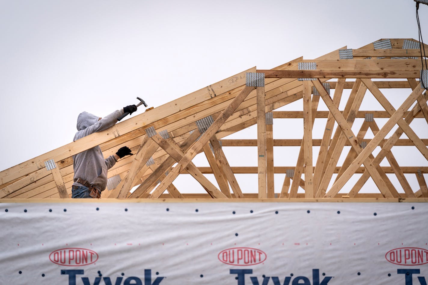 A home construction site in Woodbury. Future prices for random lengths of board are $834 per thousand board feet, triple their April low and about double the typical price in recent years.