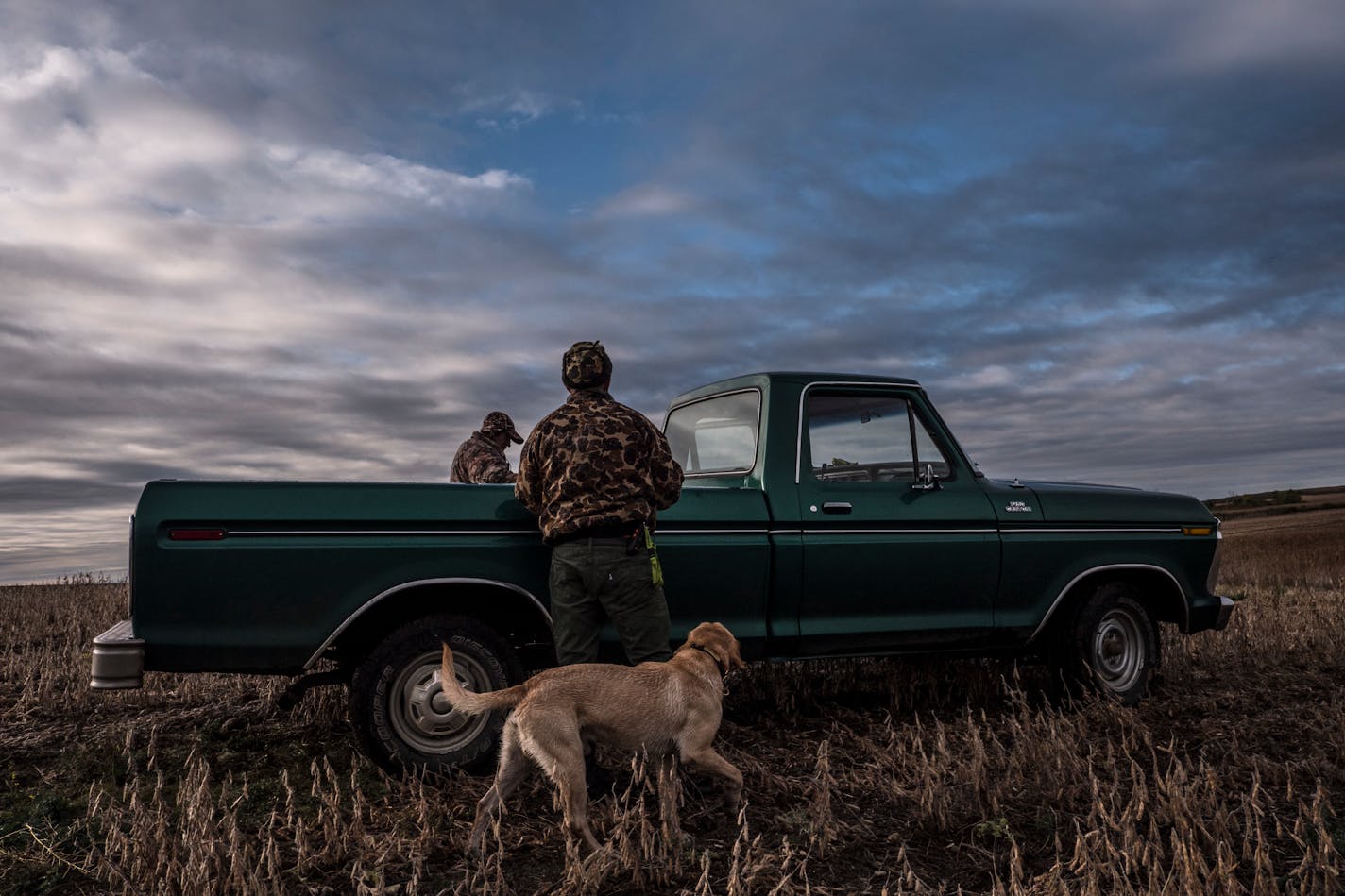 Harry Krause, left, and Tony Jones loaded decoys into Krause's 1977 Ford F-150 after duck hunting near Gackle, N.D.