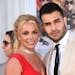 FILE - Britney Spears and Sam Asghari appear at the Los Angeles premiere of "Once Upon a Time in Hollywood" on July 22, 2019. Spears has reached a div