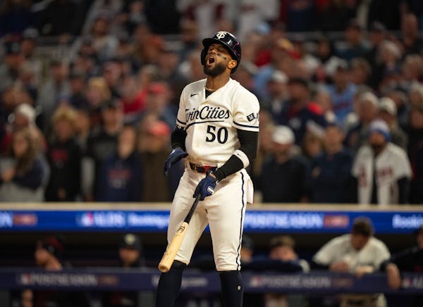 Minnesota Twins left fielder Willi Castro reacted after he struck out to end the seventh inning. The Minnesota Twins lost 3-2 to the Houston Astros in