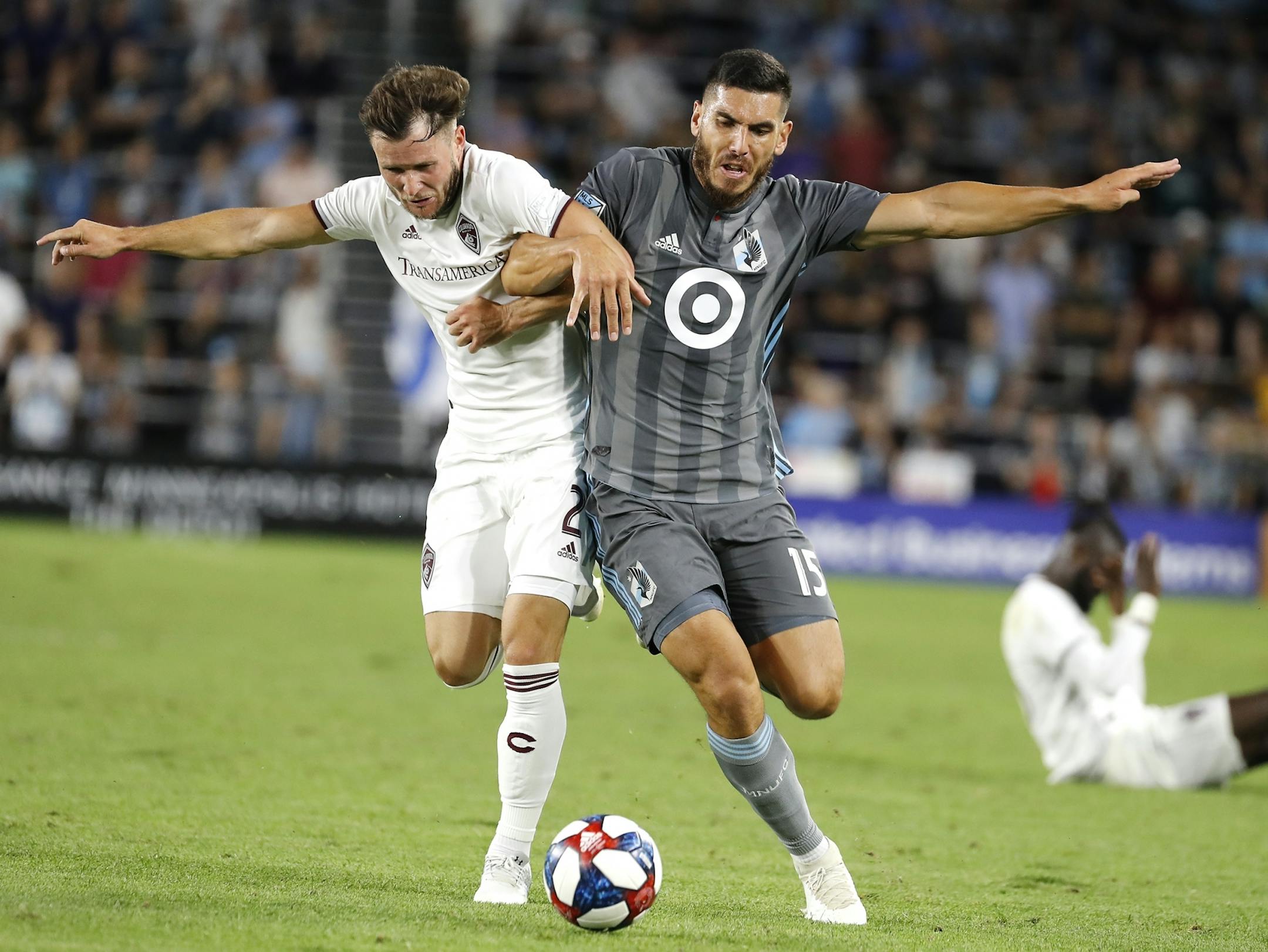 Minnesota United defender Michael Boxall (15), right, and Colorado Rapids defender Keegan Rosenberry (2) battled during the second half.