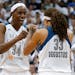FILE - In this Oct. 14, 2015, file photo, Minnesota Lynx center Sylvia Fowles (34) celebrates with Seimone Augustus (33) after beating the Indiana Fev