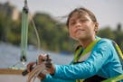 Alexandra Quiterio, 11, learned how to sail during an outing at Bde Maka Ska. The Minneapolis Sailing Center teamed up with Outdoor Latino Minnesota t