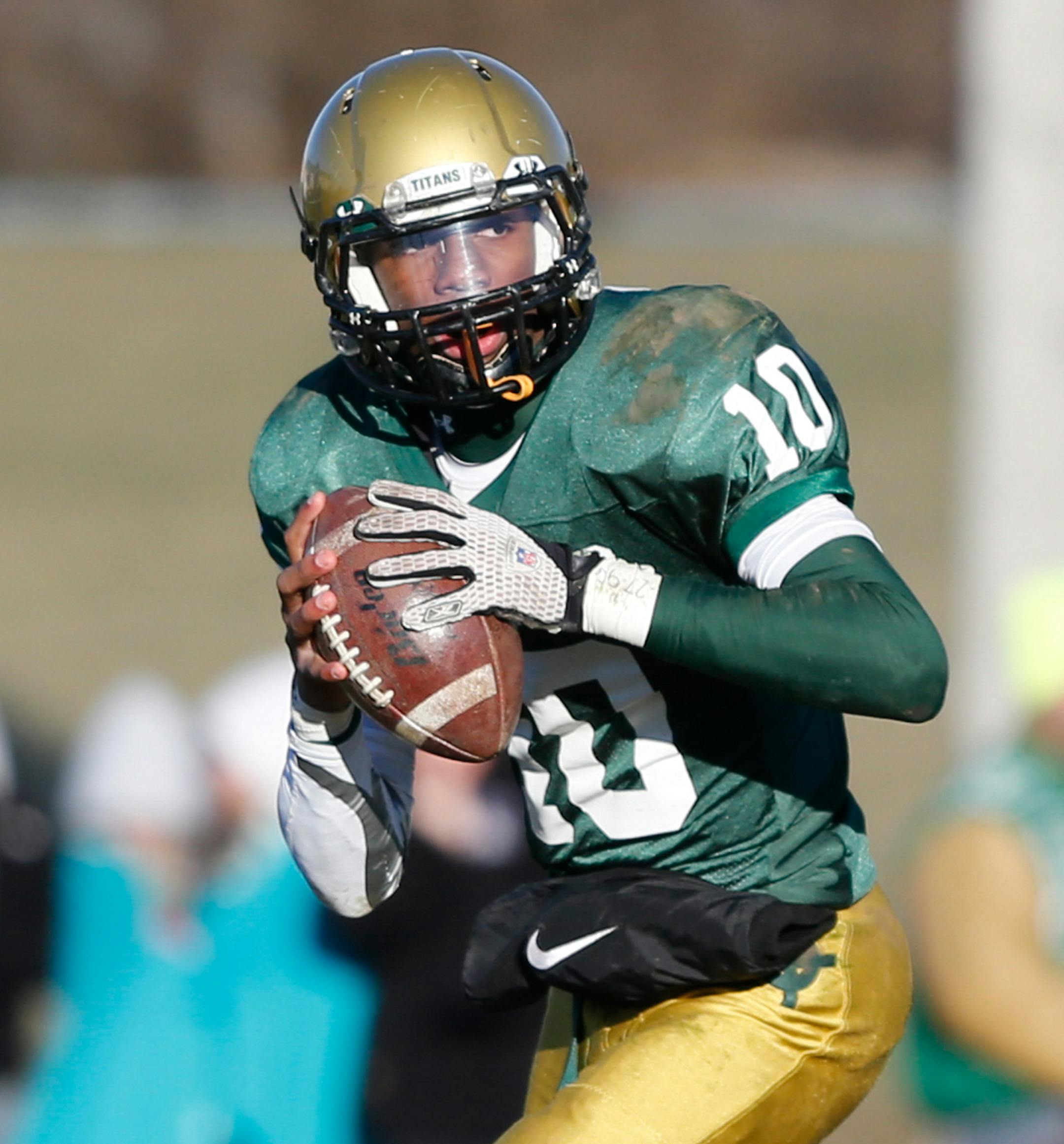 Boylan's Demry Croft looks for an open receiver during the third quarter on Saturday, Nov. 23, 2013, at Boylan High School in Rockford. BRENT LEWIS/RRSTAR.COM Photo used with permission from The Rockford Register Star and RRSTAR.COM ORG XMIT: MIN1501271122596953