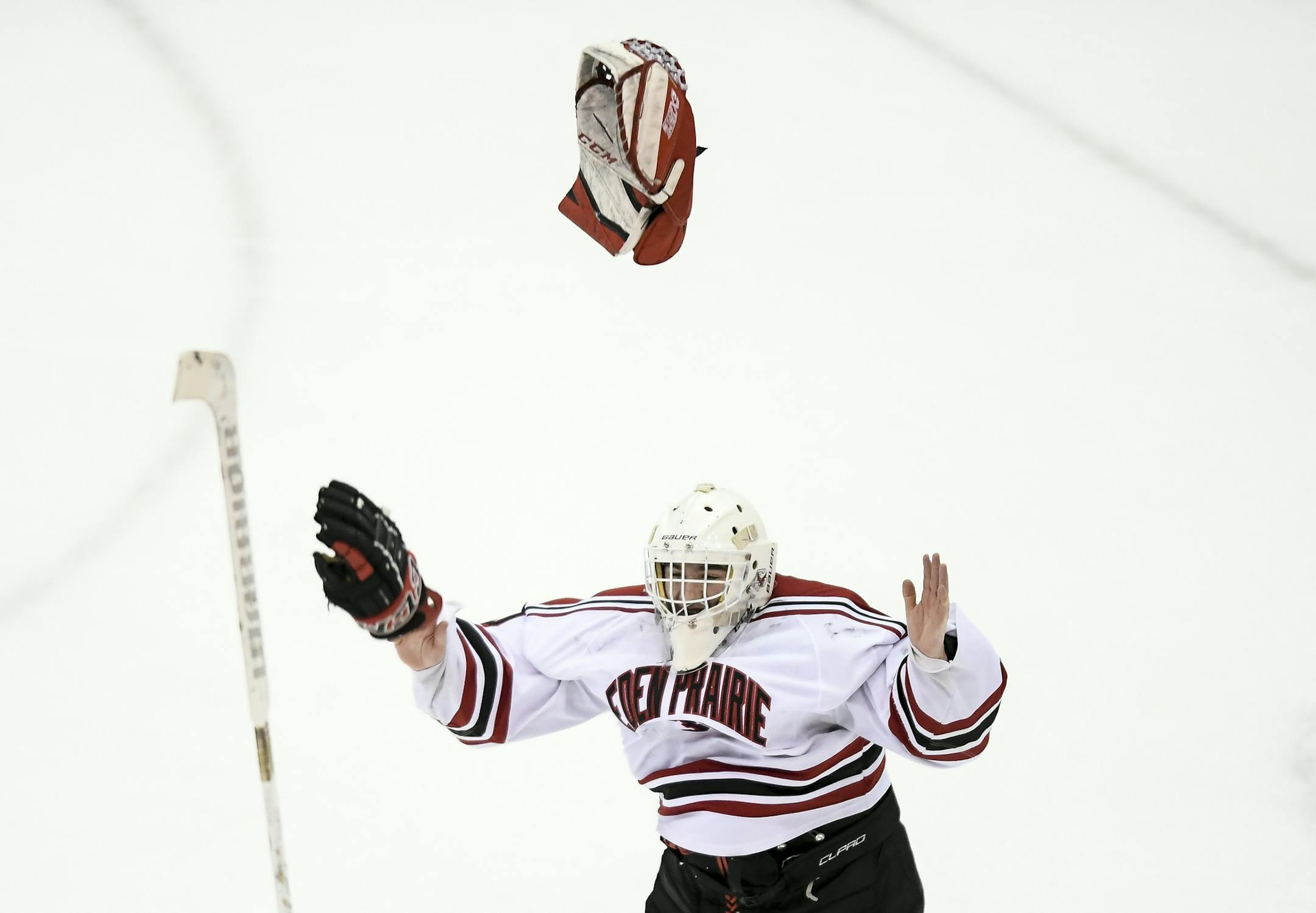 Eden Prairie players, including goaltender Axel Rosenlund (30), celebrated their 3-1 victory over Holy Family in the section finals on Feb, 27 at 3M Arena at Mariucci. Photo: Aaron Lavinsky ¥ aaron.lavinsky@startribune.com