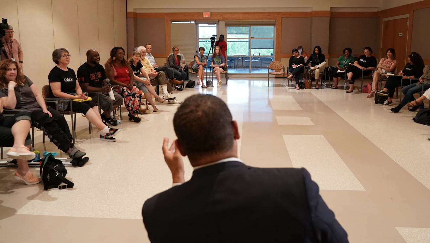 Minnesota Attorney General Keith Ellison listened to attendees introduce themselves and describe incidents in the school district that motivated them to organize. ] MARK VANCLEAVE &#xa5; Minnesota Attorney General Keith Ellison met with Chaska residents at a discussion hosted by anti-racist community group Residents Organizing Against Racism on Tuesday, Aug. 20, 2019 in Chaska.