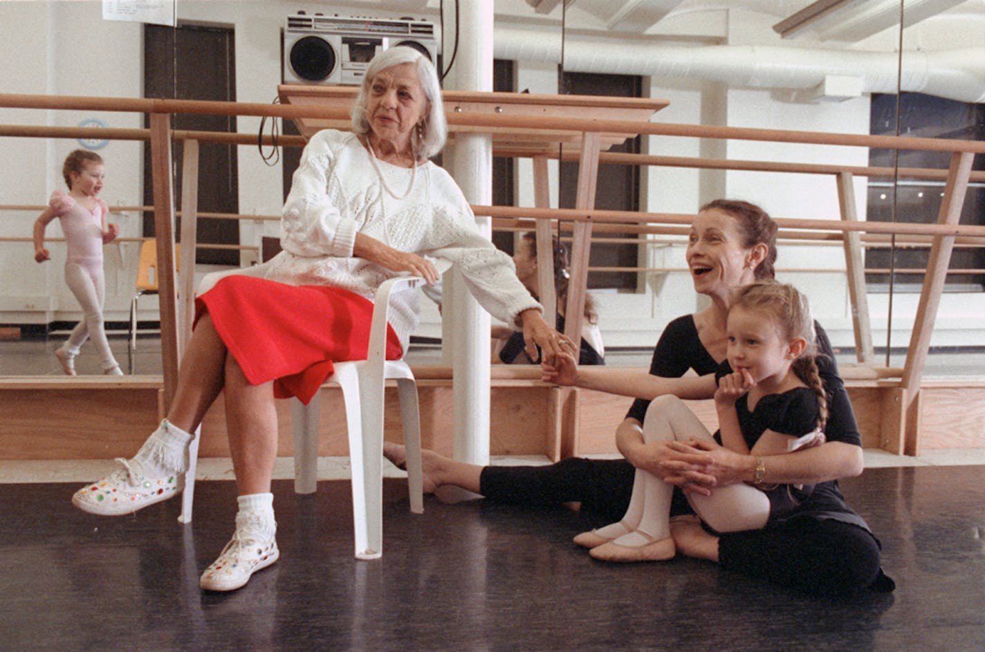 Loyce Houlton, at left, with daughter Lise and granddaughters Raina (in mirror) and Kaitlyn in 1993.