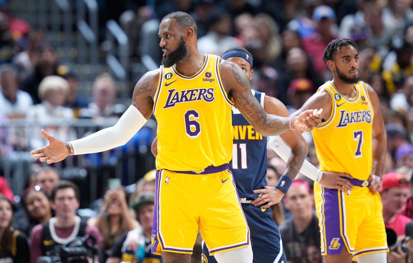 Los Angeles Lakers forward LeBron James argues for a call in the second half of an NBA basketball game against the Denver Nuggets Wednesday, Oct. 26, 2022, in Denver. (AP Photo/David Zalubowski)