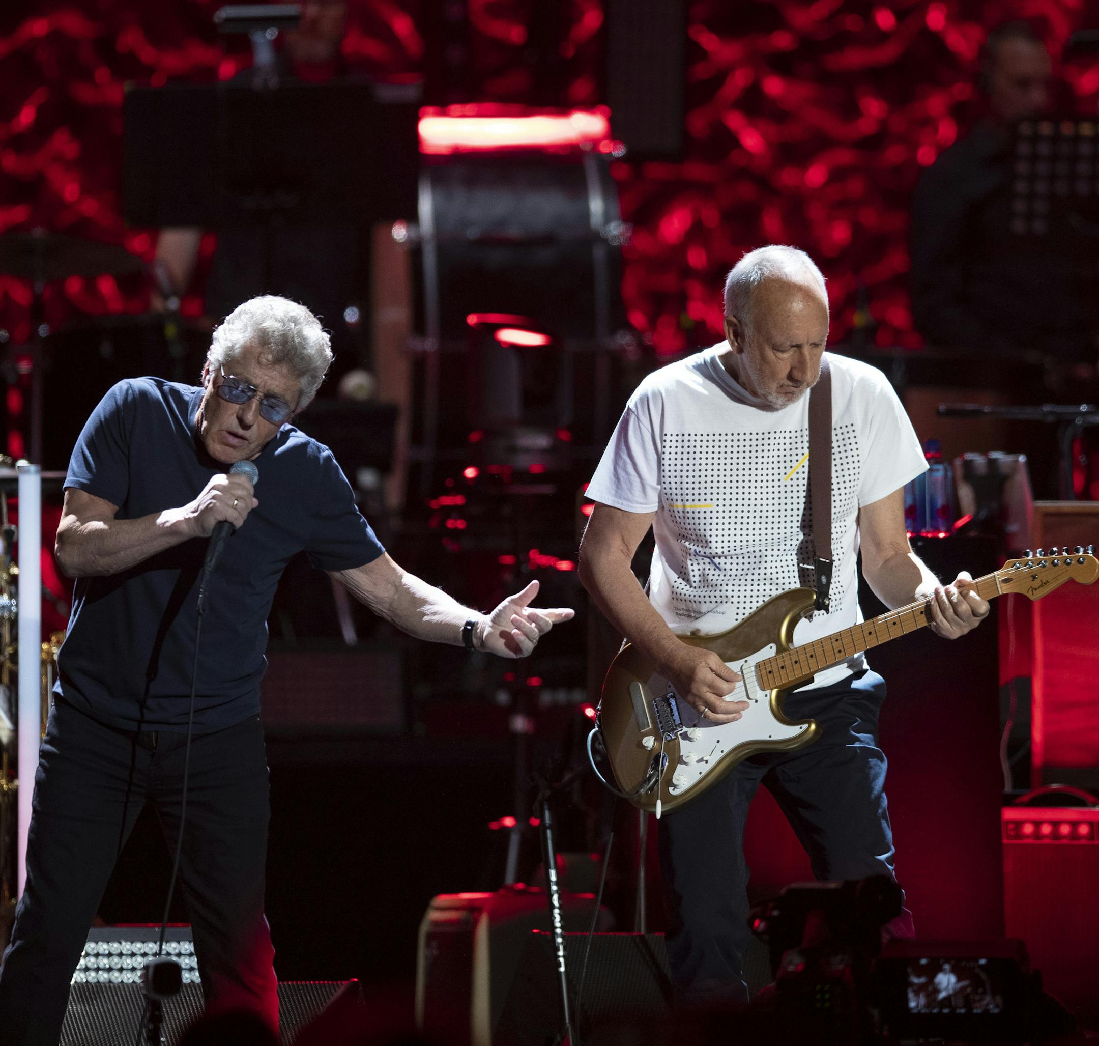 Lead singer Roger Daltrey with guitarist Pete Townshend during Amazing Journey early in The Who's show at Xcel Friday night. ] JEFF WHEELER &#x2022; jeff.wheeler@startribune.com The Who were joined by an orchestra for their Moving On! tour stop at Xcel Energy Center in St. Paul Friday night, September 6, 2019.