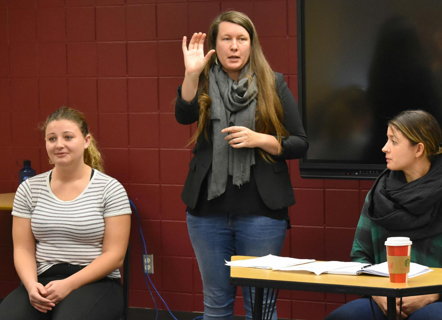 Ariane Schaefer interpreted at the trial as Hamline freshman Maddie Thieschafer, left, and Kelly Rodgers observed.