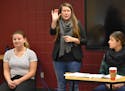 Ariane Schaefer interpreted at the trial as Hamline freshman Maddie Thieschafer, left, and Kelly Rodgers observed.