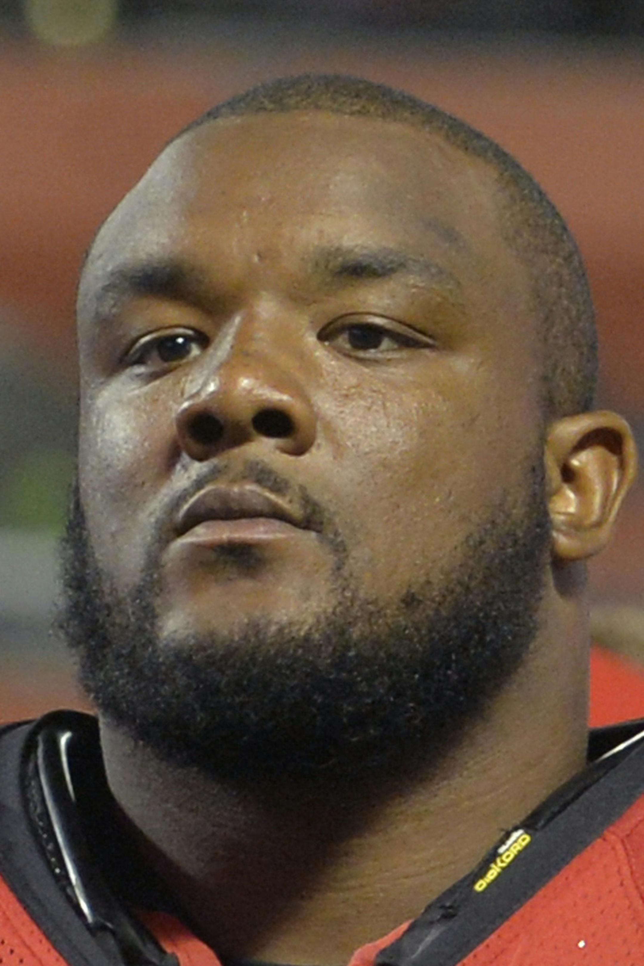 FILE - In this Aug. 18, 2016, file photo, Atlanta Falcons defensive tackle Ra'Shede Hageman (77) walks off the field after an NFL preseason football game against the Cleveland Browns, in Cleveland. Falcons coach Dan Quinn confirmed Monday, Sept. 12, 2016, that Hageman is facing domestic violence charges. (AP Photo/David Richard, File) ORG XMIT: MIN2016091412203818