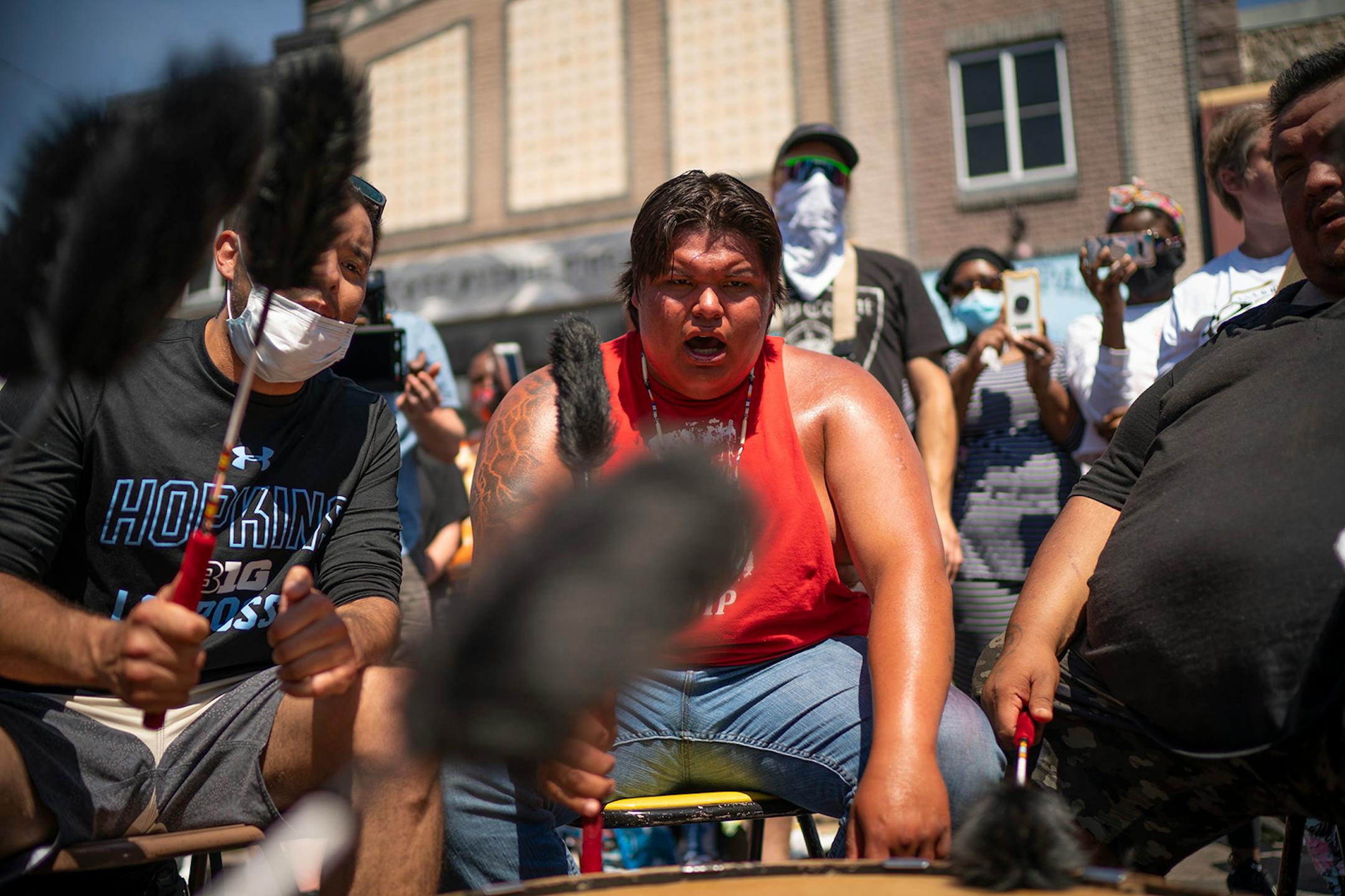 Wakinyan Janise was among a group of young Native Americans that came from Sisseton, S.D., to pay their respects at the memorial to George Floyd on Sunday, June 7. They were singing and performing in a drum circle.