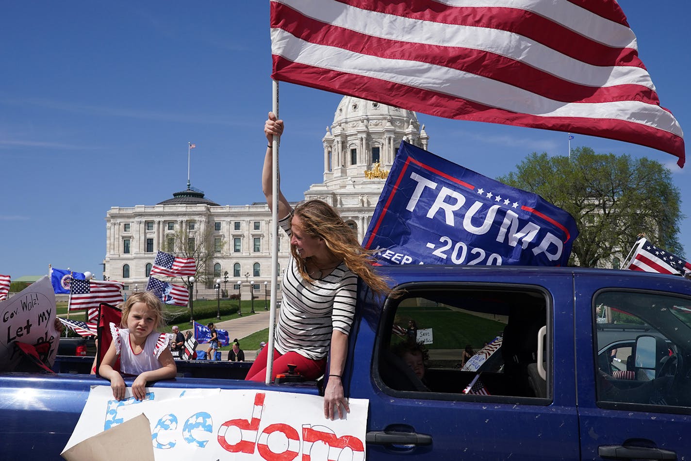 Supporters of President Donald Trump circled the State Capitol as they protested the Stay Home MN orders meant to slow the spread of COVID-19 Saturday.