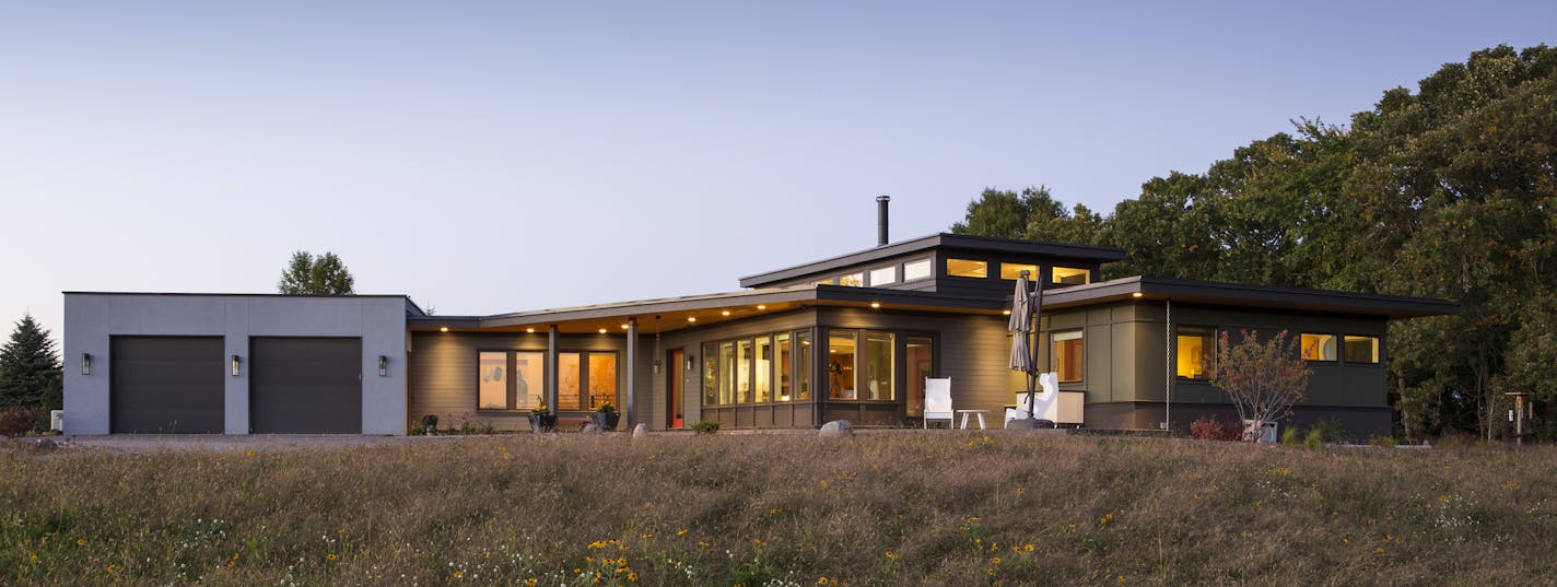 The eco-friendly Lake Elmo residence is surrounded by a restored wildflower prairie.