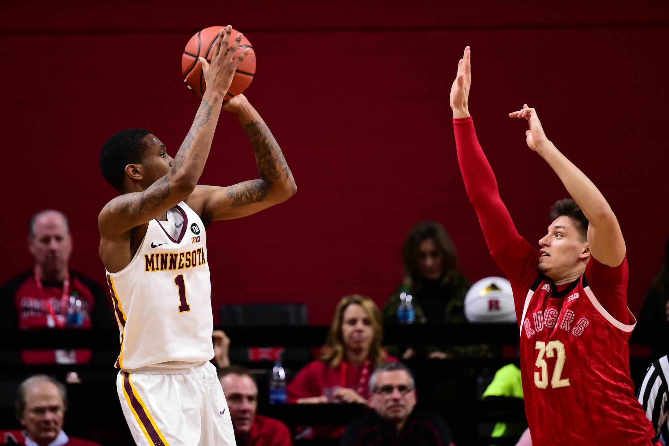 Gophers senior guard Dupree McBrayer put up a shot over Rutgers defender Peter Kiss on Sunday, Feb. 24, 2019. Rutgers beat Minnesota 68-64. (Ben Solomon/Rutgers Athletics)