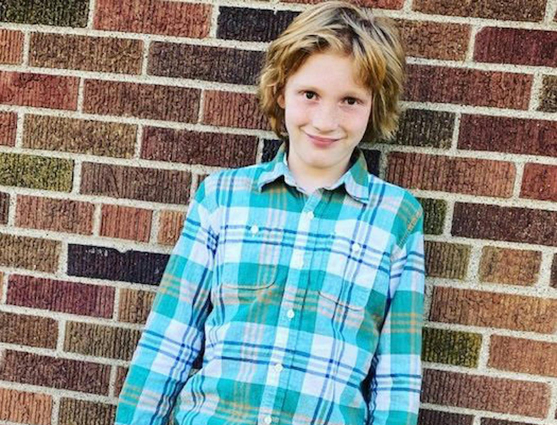 Minnesota's Waiting Child for July is 13-year-old Riley, who likes to read and play Legos.