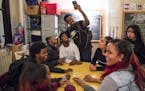 Mohamed Hassan took a selfie with friends at an after school hang-out at Roosevelt High School in Minneapolis, Minn., on December 2, 2016.